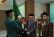 Atus Syahbudin menyerahkan Panji LDII kepada Herman Suherman Sebagai Ketua Terpilih untuk Masa Bakti 2026 - 2031